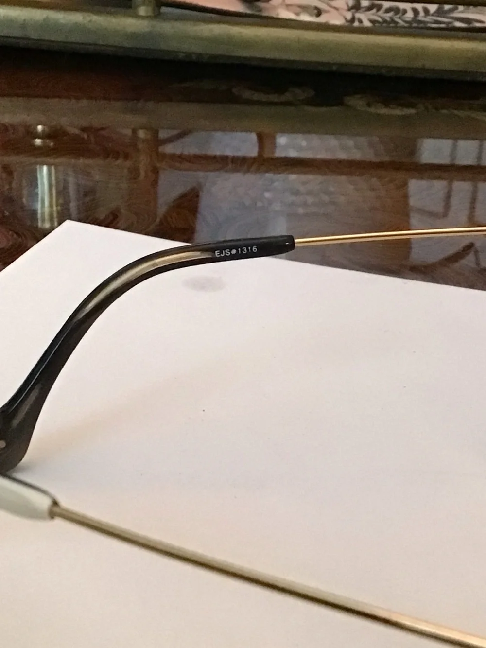 Elizabeth and James Black & White Striped Cat-Eye Sunglasses with Purple Lenses